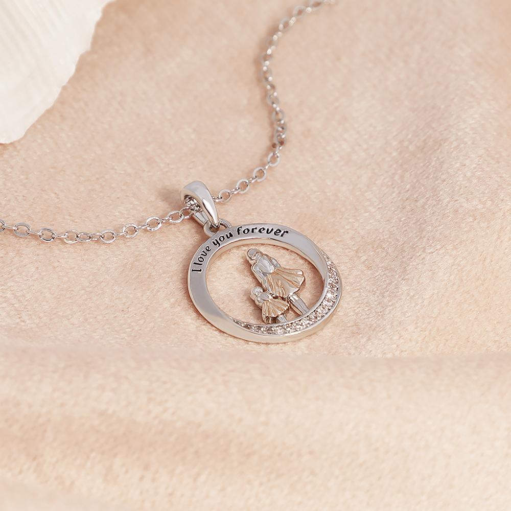 Mother and daughter holding hands diamond necklace