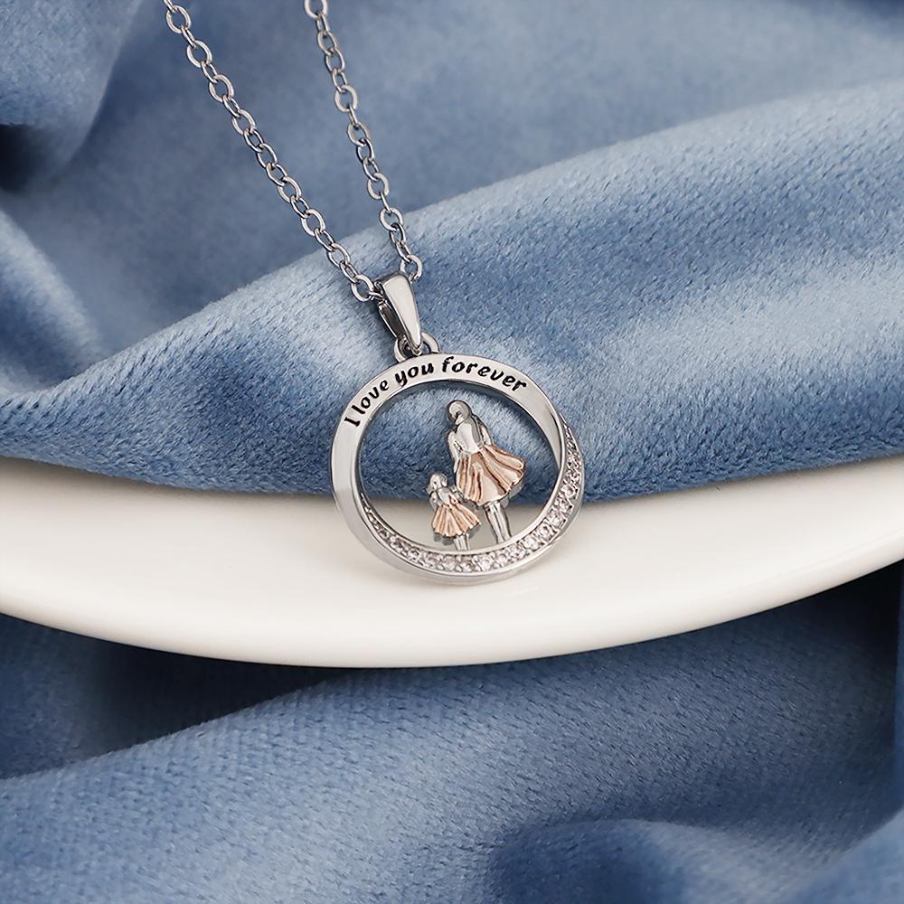 Mother and daughter holding hands diamond necklace